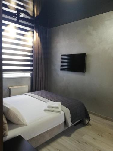 Prometey Hotelにあるベッド