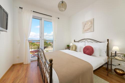 Posteľ alebo postele v izbe v ubytovaní Sun Spalato Villa Cikas