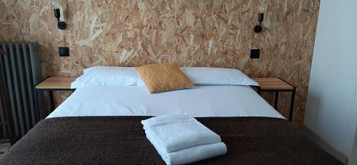Postel nebo postele na pokoji v ubytování Hotel La Belle Etoile