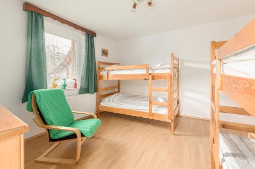 Dviaukštė lova arba lovos apgyvendinimo įstaigoje Hostel Mama Minka