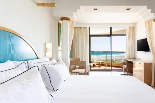 En eller flere senger på et rom på Meliá Fuerteventura
