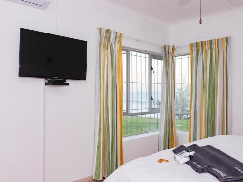 Кровать или кровати в номере Black Rock Lodge