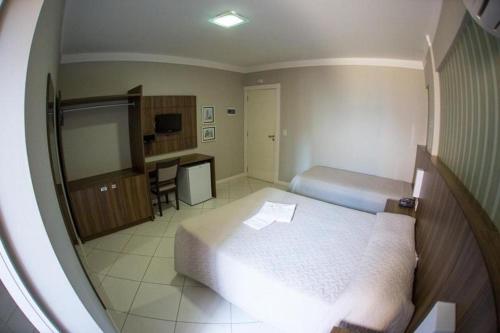 Televisyen dan/atau pusat hiburan di Hotel Contessi