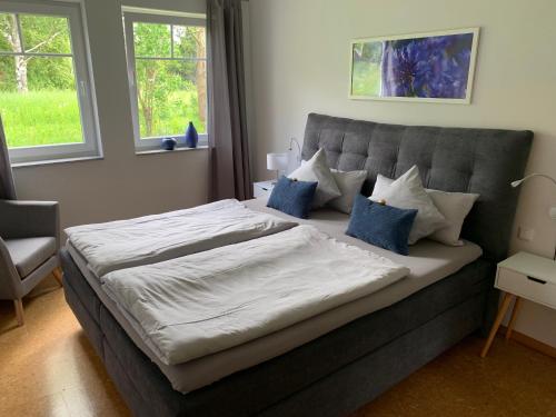 Кровать или кровати в номере Ferienwohnung „Fiordaliso“