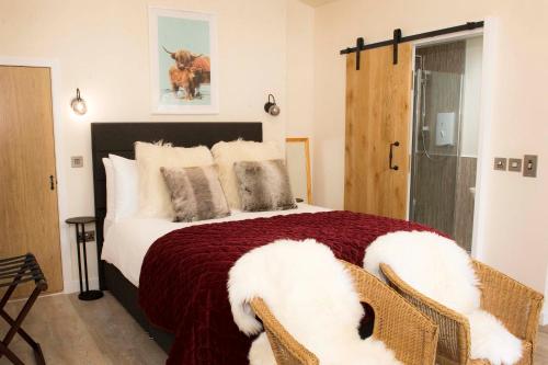 Кровать или кровати в номере Pear Tree Cottage