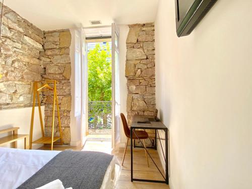 Μια τηλεόραση ή/και κέντρο ψυχαγωγίας στο Mirandoalaconcha Rooms