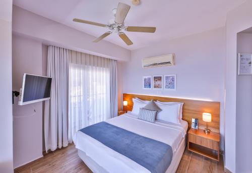 Кровать или кровати в номере Olea Nova Hotel