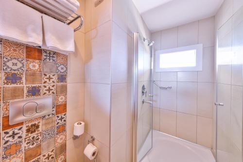Ванная комната в Olea Nova Hotel