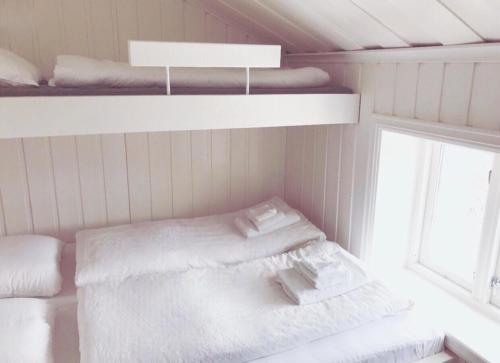 En eller flere senge i et værelse på Pålberget