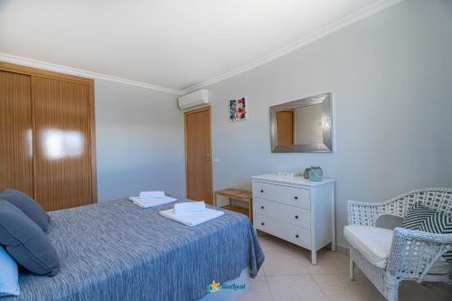 Katil atau katil-katil dalam bilik di Vila da Praia - Apartamento Viva Local