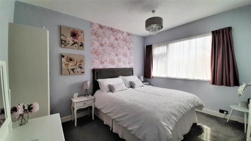 Llit o llits en una habitació de The Blackpool Apartment