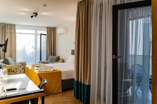 Family Hotel LAXOにあるベッド