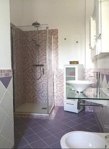 a bathroom with a shower and a sink at Villa Arenella in Vieste