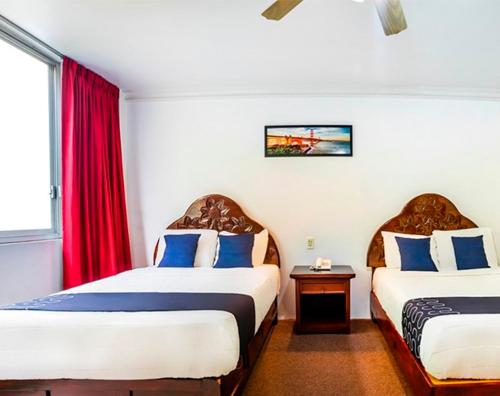 Postel nebo postele na pokoji v ubytování Hotel HC