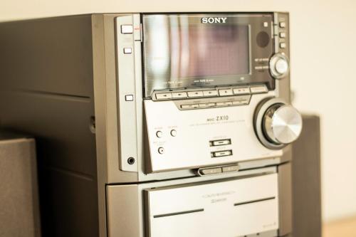 a microwave oven sitting on top of a refrigerator at Chalet Steingärtli 1 in Wengen