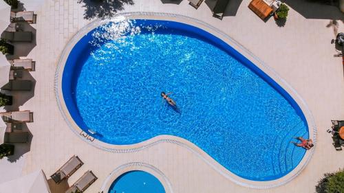 Бассейн в Olea Nova Hotel или поблизости