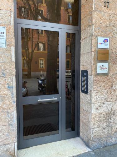 a door to a building with a sign on it at B&Bononia View in Bologna