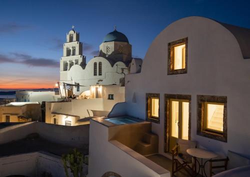a view from the roof of a building with a church at Valsamo Suites in Pyrgos