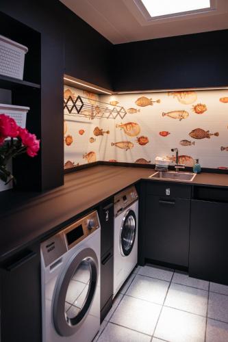 Una cocina o cocineta en River Residence