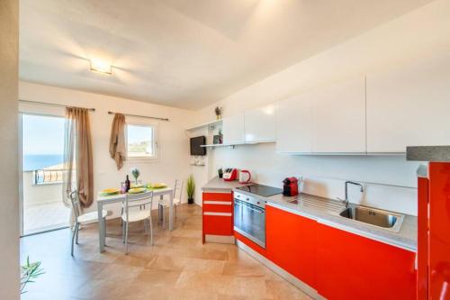 Dapur atau dapur kecil di Attico vista mare a Castelsardo con terrazzo panoramico