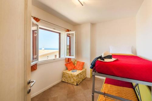 Katil atau katil-katil dalam bilik di Attico vista mare a Castelsardo con terrazzo panoramico