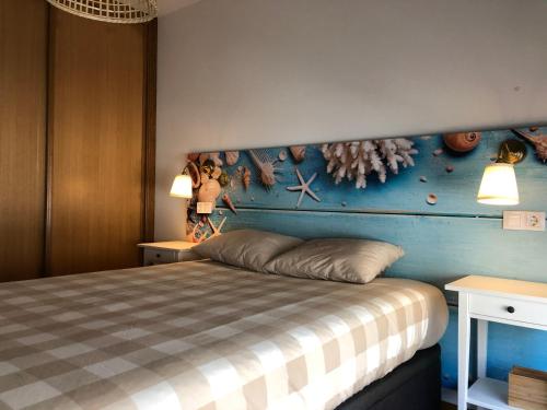 Ένα ή περισσότερα κρεβάτια σε δωμάτιο στο Apartamento Playa da Corna