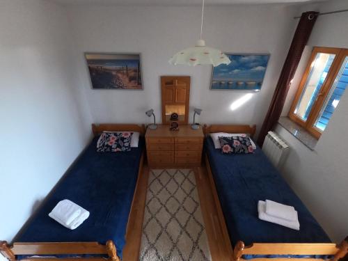 an overhead view of a room with two beds at Stone House Iva in Kraljevica