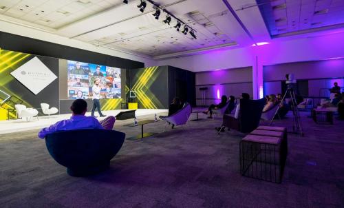 a group of people sitting in chairs in a room at Pullman Sao Paulo Vila Olimpia in Sao Paulo