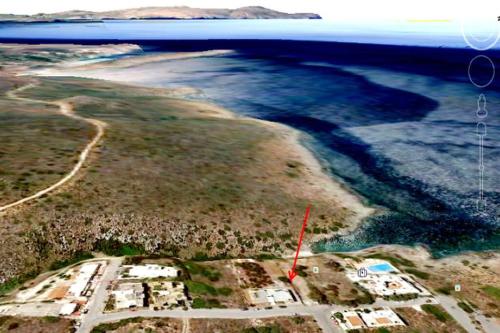 an aerial view of an island in the ocean at Magnificent sea view,clean and bright apartments in Kalathas