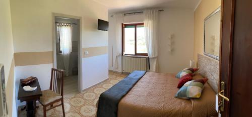 a bedroom with a large bed in a room at B&B Casa Gianfranca in Portoferraio
