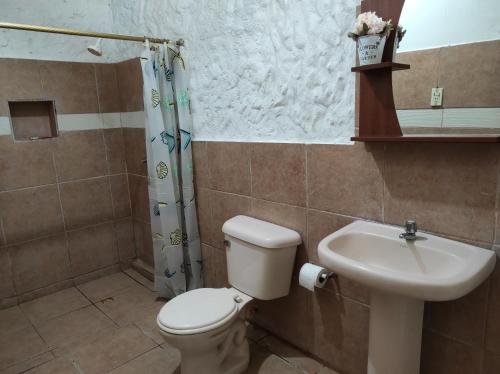 Koupelna v ubytování Caramba Hospedaje