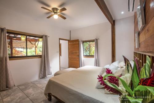 Ένα ή περισσότερα κρεβάτια σε δωμάτιο στο Villas Serenidad
