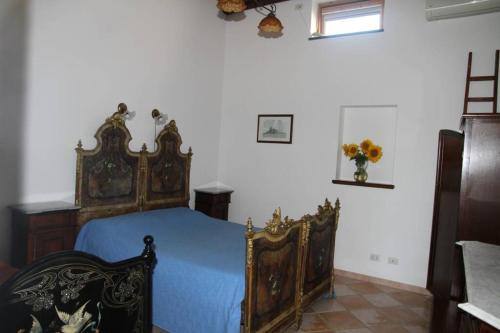 Postel nebo postele na pokoji v ubytování BOTTE - Appartementi Il Palmento