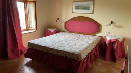Postel nebo postele na pokoji v ubytování Tenuta Montemassi Podere Montauzzo