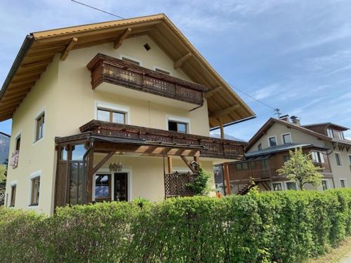 a large house with a gambrel roof at Haus Schmidl in Kötschach