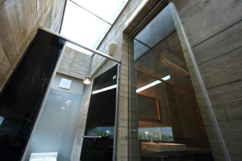 a large glass window on the side of a building at Penlai Home in Fengli