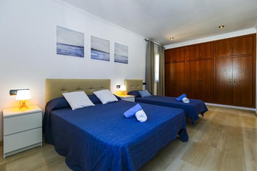 Säng eller sängar i ett rum på Barlovento Planet Costa Dorada