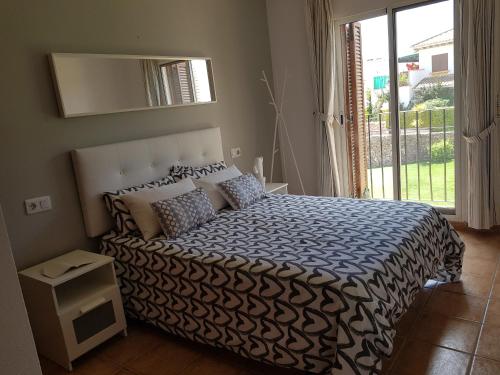 Postel nebo postele na pokoji v ubytování Cozy apartment in Vera Playa, Almeria, Andalucia, Spain