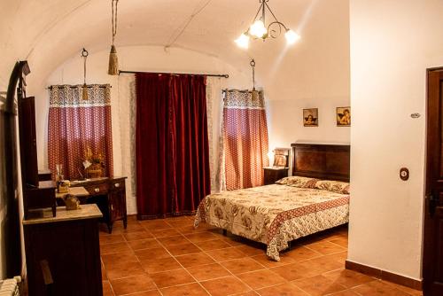 Voodi või voodid majutusasutuse Casa Rural Los Gaitanes toas