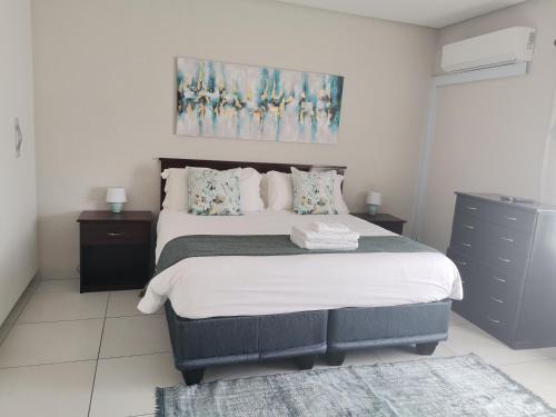 Katil atau katil-katil dalam bilik di Margate Beach Lodge