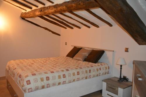 Un pat sau paturi într-o cameră la La Casa de Villar