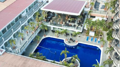an aerial view of a hotel with a swimming pool at Clarkton Hotel Apartment in Angeles