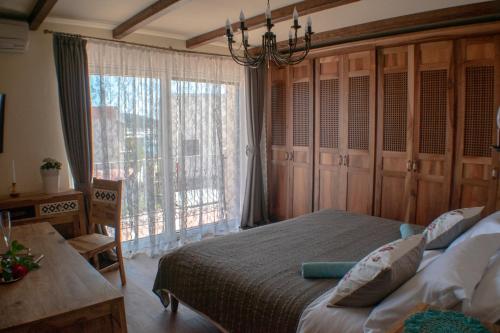 Giường trong phòng chung tại Villa Veronika