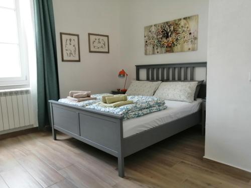 Postel nebo postele na pokoji v ubytování Casa Sansevera Lucca