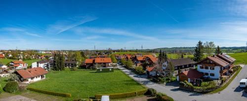an aerial view of a village with houses at Boutique Hotel Angerer in Murnau am Staffelsee