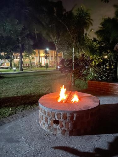 a fire pit in a park at night at Red island villas in Banyuwangi
