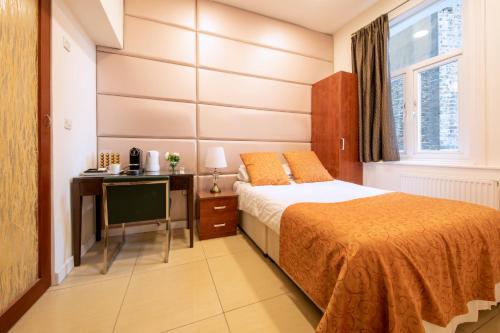 Postel nebo postele na pokoji v ubytování City Inn Russell Square