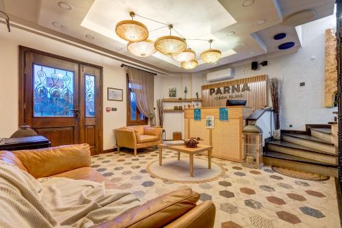 Χώρος καθιστικού στο Parna Hotel