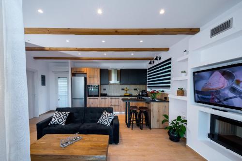 Η κουζίνα ή μικρή κουζίνα στο Magnolia Homes Zakynthos