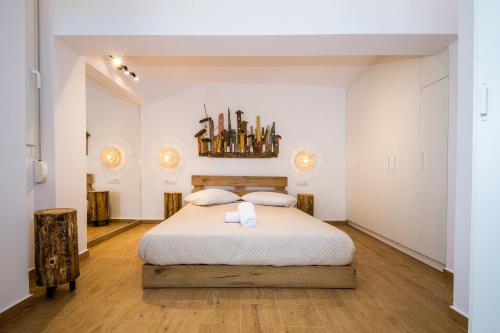 Ένα ή περισσότερα κρεβάτια σε δωμάτιο στο Magnolia Homes Zakynthos